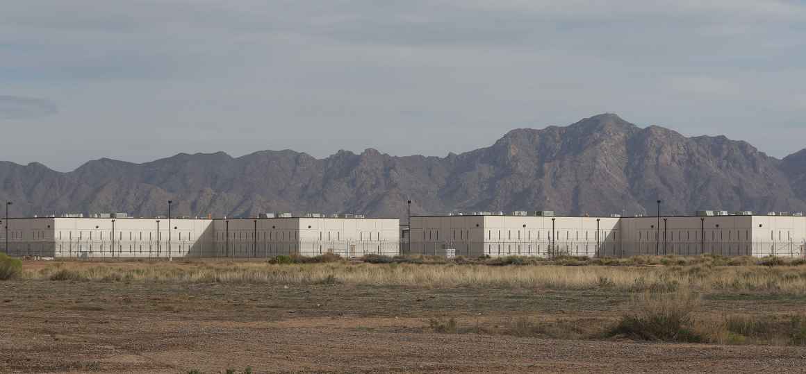 Saguaro-Correctional-Facility-CCA-Fence-CCA-mountains-Eloy-Arizona1.jpg