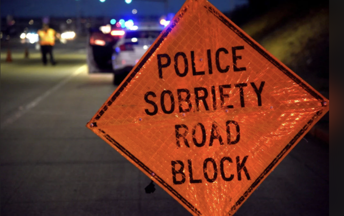 sign of police sobriety road block