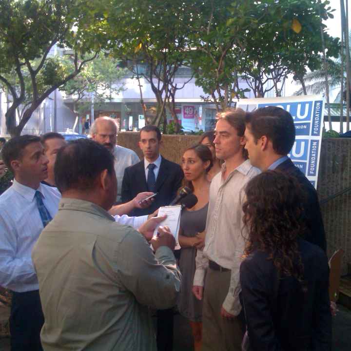 Tess and Jaime Meier, with their attorneys, speak to the press.